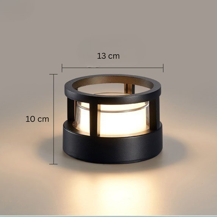 Ronde lamp met open ringvormige bovenkant en maatlijnen die een breedte van 13 en een hoogte van 10 cm tonen. 13