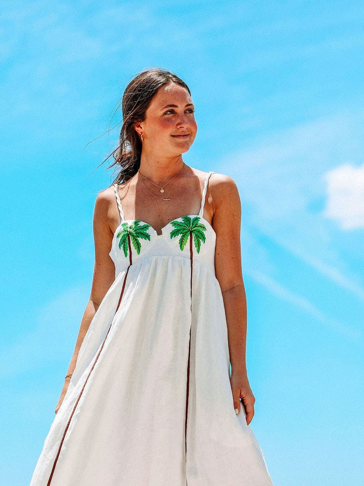 Trendy schouderjurk met tropische palmprint – Estelle