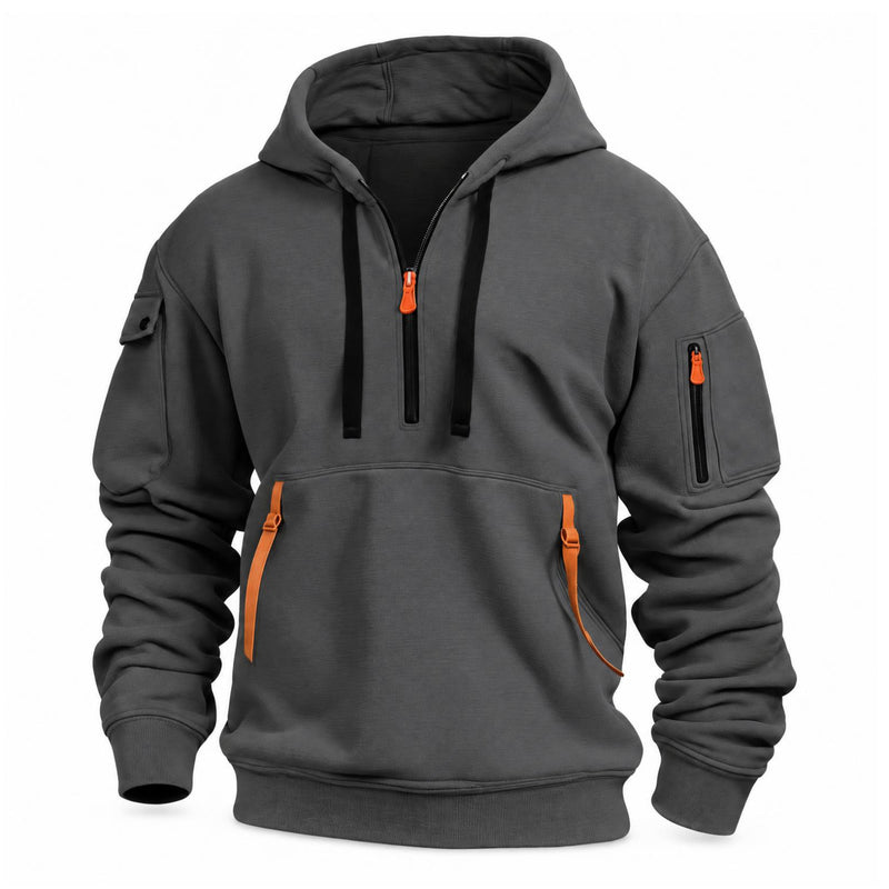 Donkergrijze hoodie met halve rits, zwarte trekkoorden en oranje bandjes aan de kangoeroezak, vooraanzicht 6