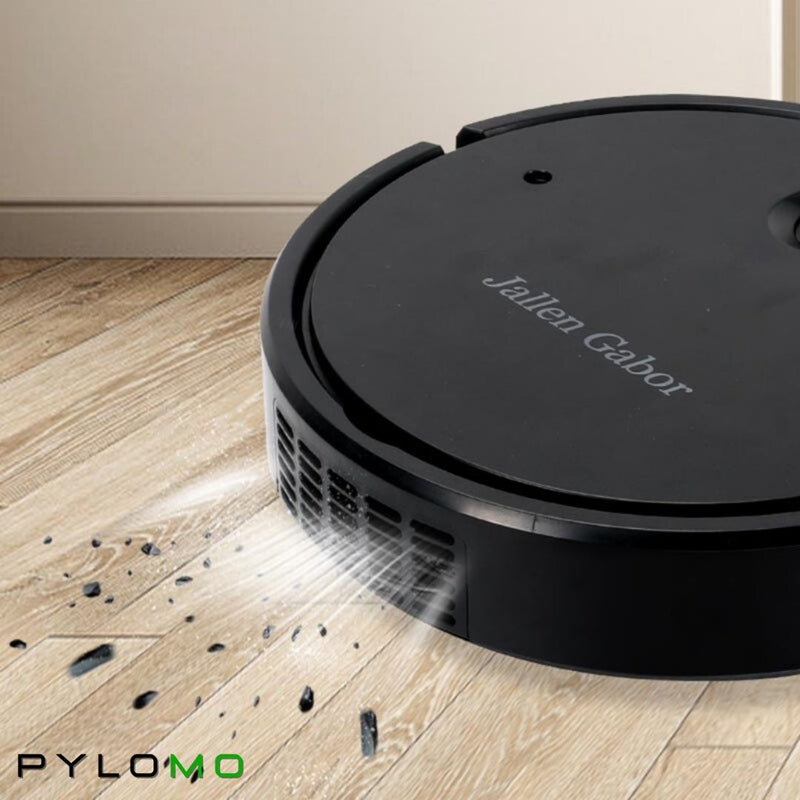 Zwarte robotstofzuiger op een parketvloer die opgezogen vuildeeltjes en stof bij de luchtopeningen laat zien. 5