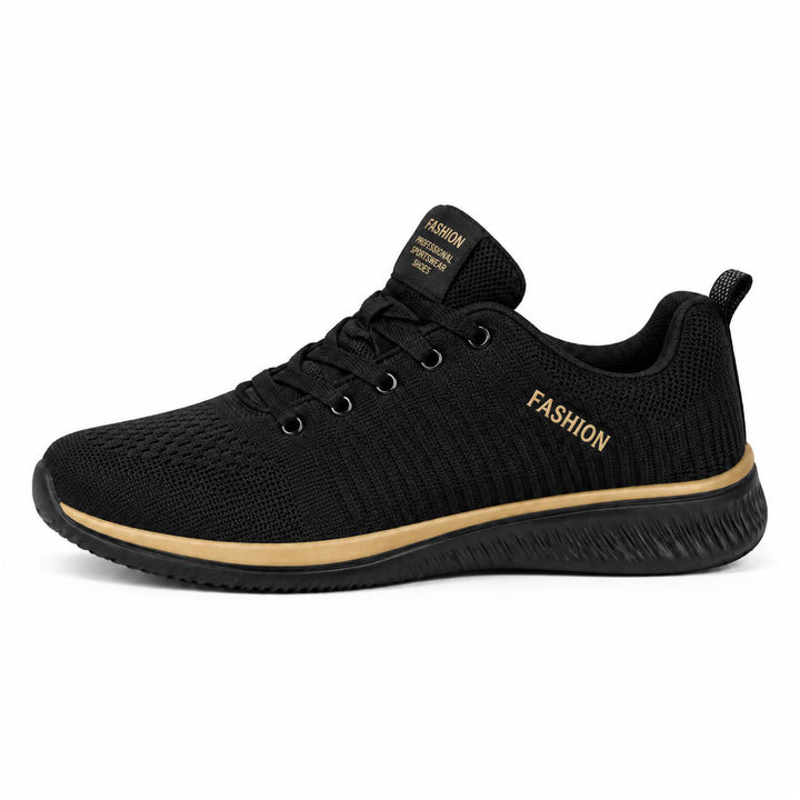 Zijaanzicht van zwarte gebreide sneaker met goudbruine accenten op de zoolrand en een ribbelstructuur 5