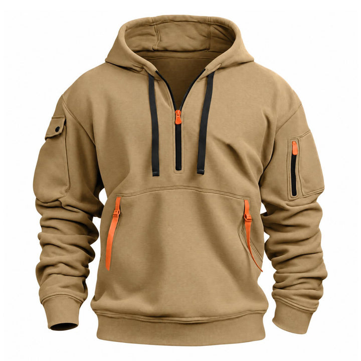 Zandkleurige hoodie van voren met zwarte trekkoorden, oranje ritsen en zak op de mouw 4