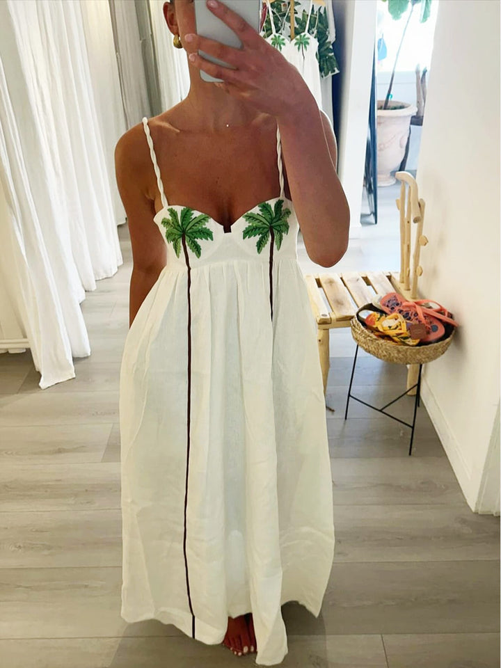 Trendy schouderjurk met tropische palmprint – Estelle