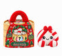 Rood-wit gestreepte knoedelknuffel met rode strik naast de rode kerststoommand met pluchen handvat 15