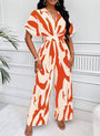 Sommerlicher Jumpsuit mit V-Ausschnitt und Print – Noemi