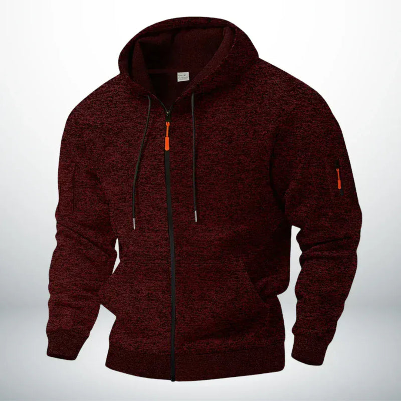 Dezelfde hoodie in gemêleerd bordeauxrood, voorkant met capuchon, doorlopende rits, zakken en ritszakje op de mouw. 2