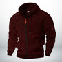 Dezelfde hoodie in gemêleerd bordeauxrood, voorkant met capuchon, doorlopende rits, zakken en ritszakje op de mouw. 2