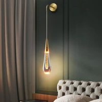 Wandleuchte in Tropfenform mit warmem Lichtschein - Solena