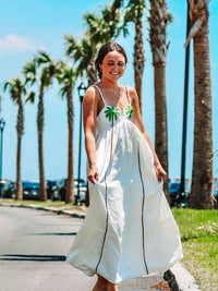 Trendy schouderjurk met tropische palmprint – Estelle