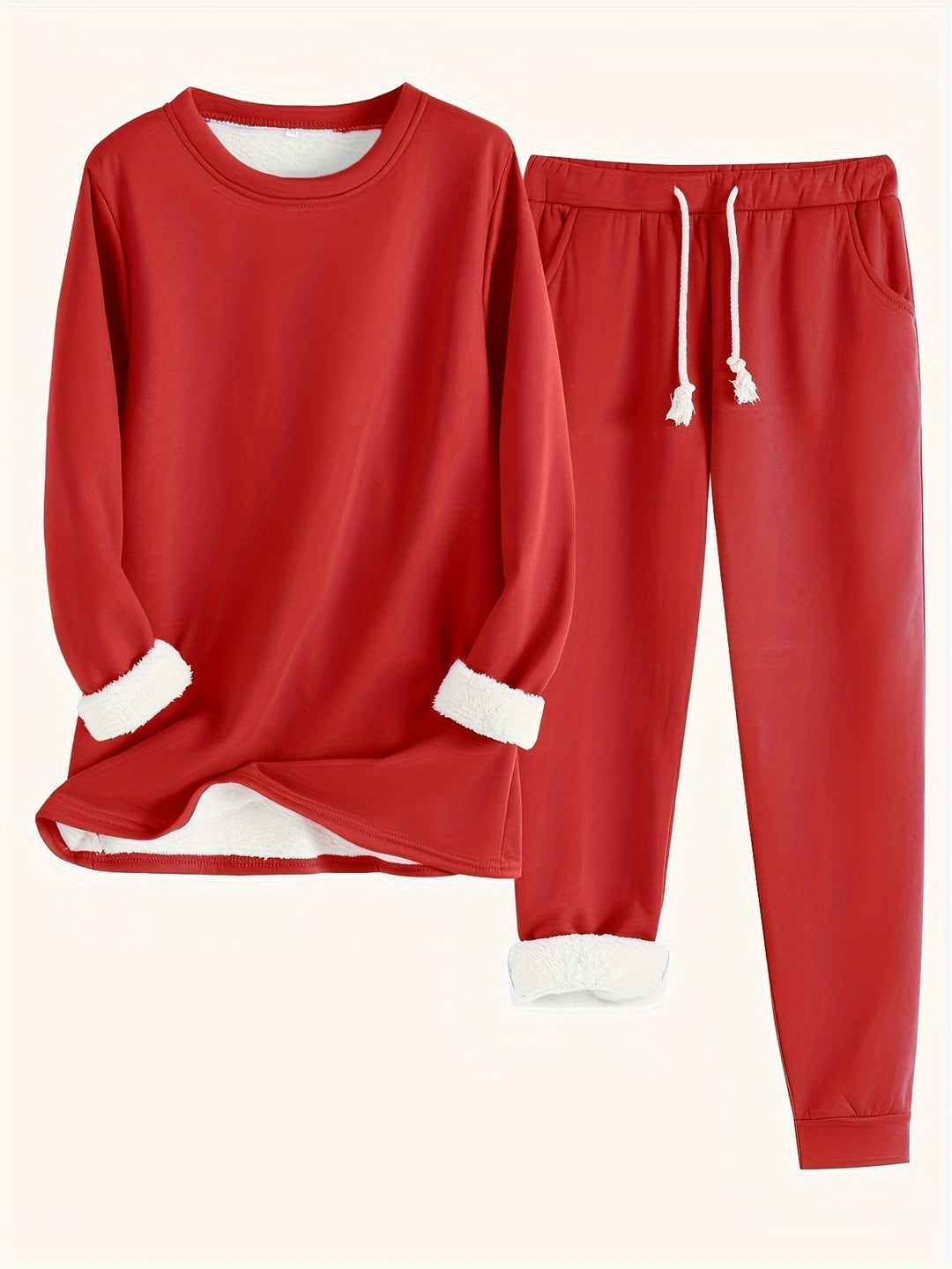 Tweedelige set in rood: trui en joggingbroek met zakken en trekkoord, pluizige witte voering zichtbaar aan mouwen en 9