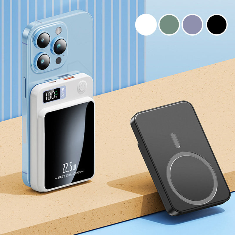Witte powerbank magnetisch vastgeklikt op de achterkant van een blauwe smartphone, naast een zwarte; vier kleuropties staan rechtsboven. 5