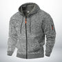 Dezelfde hoodie in gemêleerd lichtgrijs, voorkant met capuchon, trekkoord, oranje ritstrekker en ritszakje op de mouw. 3