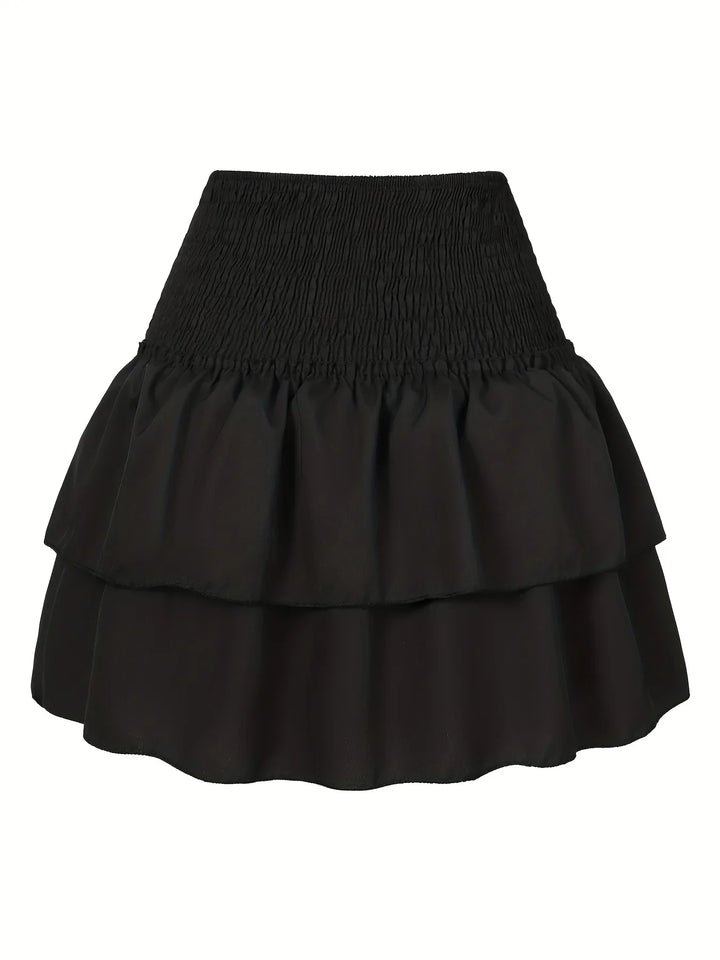 Amelia Rock | Gefaltete Taille | Gestufter Saum | Modisch