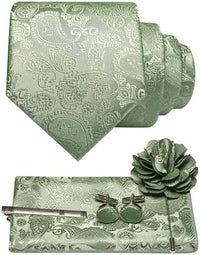 Paisleyset in saliegroen: opgerolde das, pochet, manchetknopen, dasspeld en een bloemvormige reversspeld in dezelfde kleur. 30