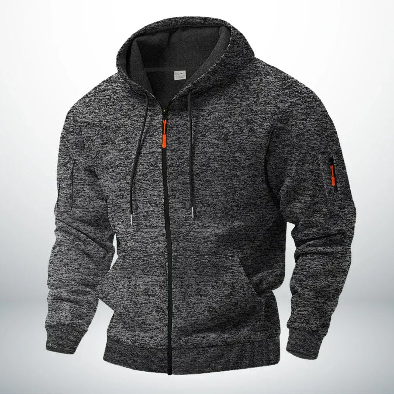 Dezelfde hoodie in gemêleerd donkergrijs, voorkant met capuchon, trekkoord, ribboorden en ritszakje op de mouw. 5