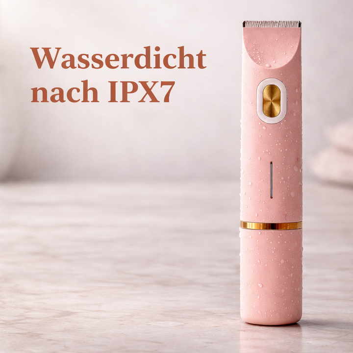 Roze trimmer met waterdruppels staat rechtop op een marmeren ondergrond en toont de waterdichte uitvoering. 11