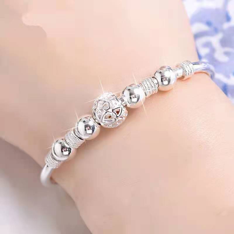 Bracelet with silver lucky beads