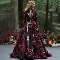 Model in zwarte maxi-jurk met skeletprint en donkerrode 3D-bloemen, volledig zichtbaar in een bos met pompoenen. 5