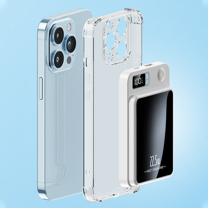 Smartphone met doorzichtig hoesje en losse witte powerbank ernaast, om te tonen hoe de oplader magnetisch op het toestel past. 7