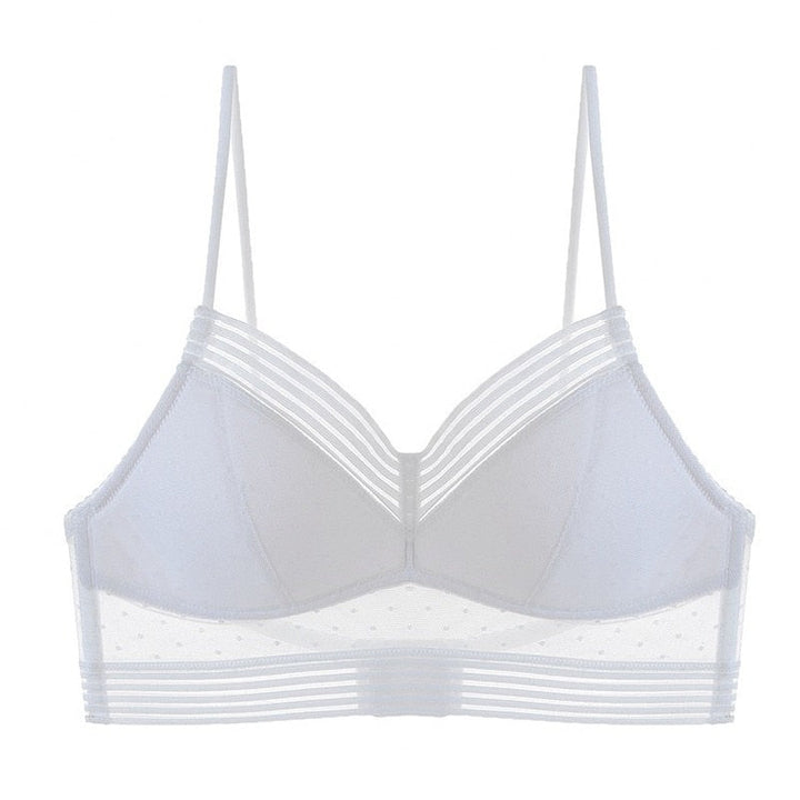 Losse witte bralette van voren met gestippeld mesh, gestreepte randen en dunne verstelbare bandjes. 9