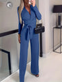 Weit ausgestellte Jumpsuit mit Gürtel und V-Ausschnitt - Elise
