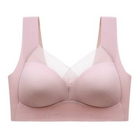 Roze bh zonder bandjes-look met brede schouderbanden, naadloze cups en mesh-inzetstuk, los op witte achtergrond. 11