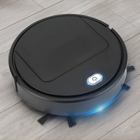 Zwarte robotstofzuiger op een houten vloer, met oplichtende aan/uit-knop, blauwe led-rand en zijborstels aan de onderkant. 2