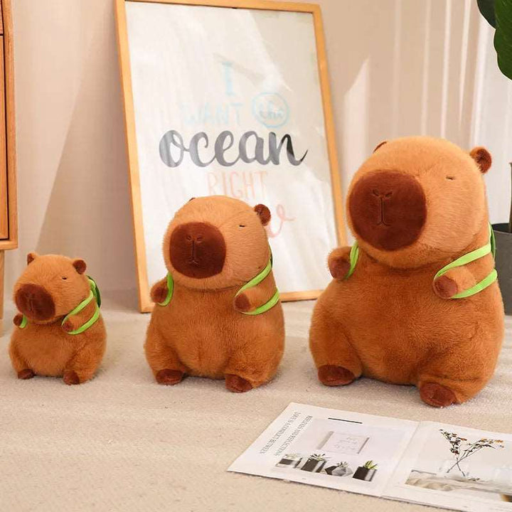 Süßes Capybara-Kuscheltier mit Schildkröten-Rucksack - CapyBuddy