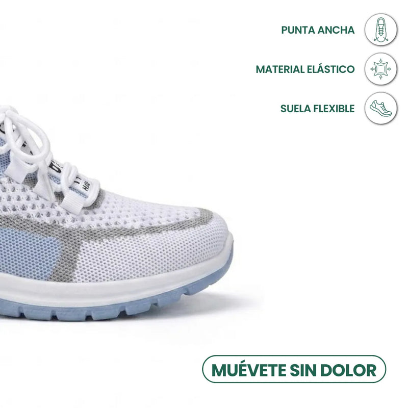 Close-up van de brede neus van de witte gaas sneaker met pictogrammen voor ruime neus, elastisch materiaal en flexibele zool. 5