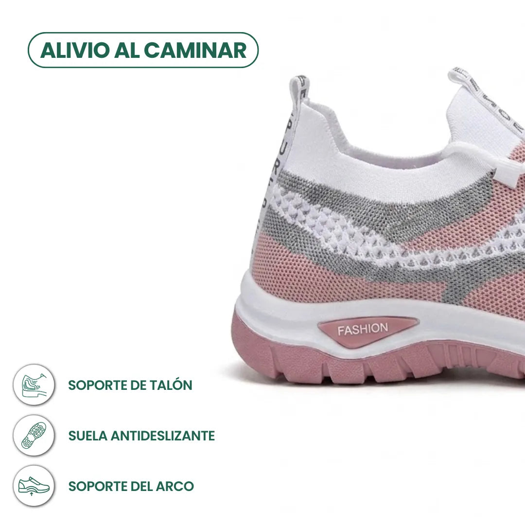 Achterkant en hiel van de witte sneaker met roze en grijs gaas, met pictogrammen voor hielsteun, antislipzool en voetboogsteun. 22