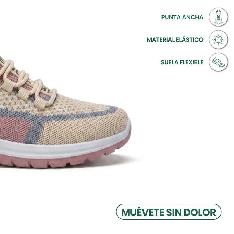 Neus van de beige gaas sneaker met roze en blauwgrijze accenten, met pictogrammen voor brede neus, elastisch materiaal en flexibele zool. 32