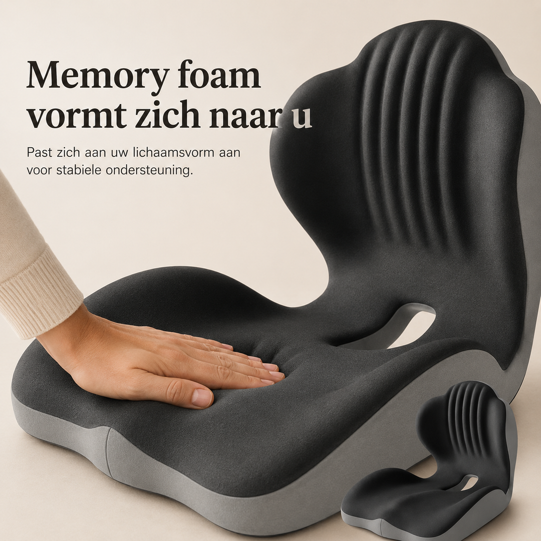 Hand drukt in het zachte traagschuim van het zitkussen, met een kleiner kussen rechtsonder 3