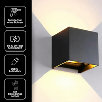 Zwarte kubuslamp met pictogrammen voor montage zonder boren, accuduur, usb-c-oplaadbaarheid en bewegingssensor. 18