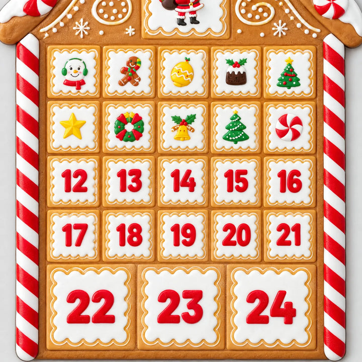 Close-up van de onderste vakjes van het huisje, met kerstplaatjes bovenaan en de rode cijfers 12 tot en met 24 op wit glazuur. 3