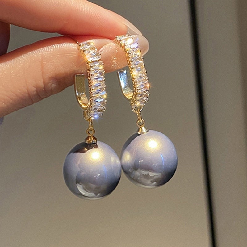 Luxuriöse Perlenohrringe mit Zirkonia - Delphine