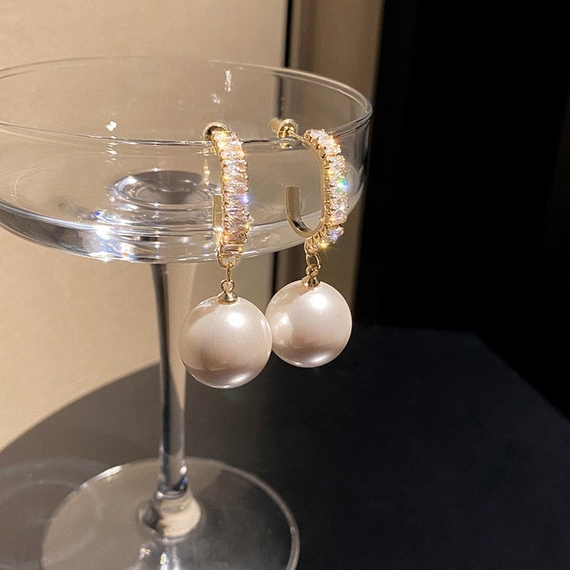 Luxuriöse Perlenohrringe mit Zirkonia - Delphine