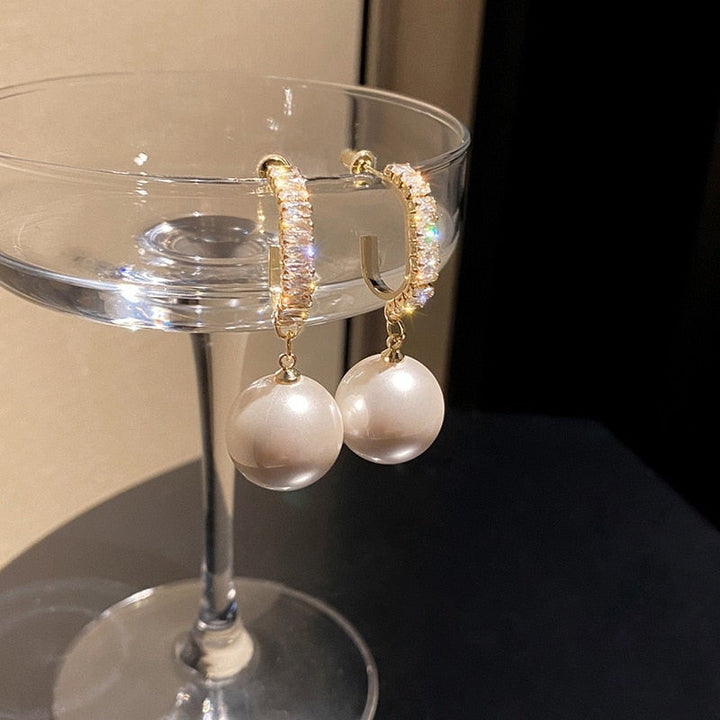 Luxuriöse Perlenohrringe mit Zirkonia - Delphine