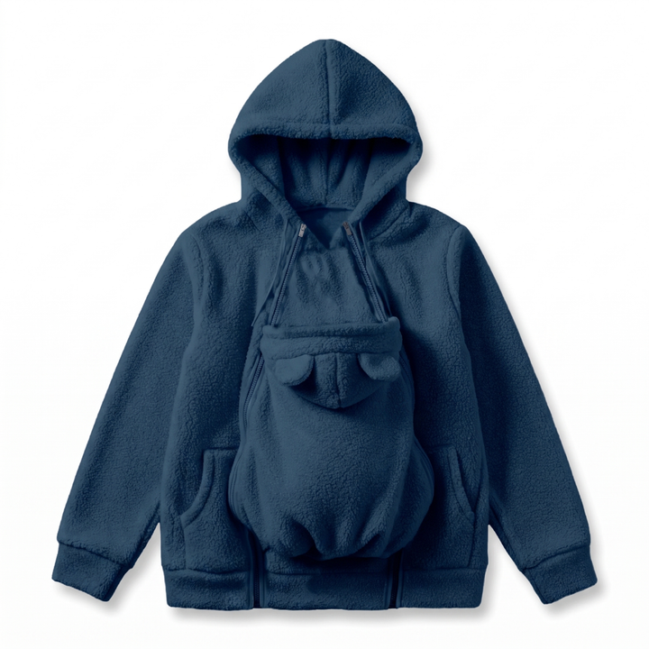 Marineblauwe sherpa-fleecehoodie plat gelegd met het afneembare babypaneel met beren-oortjes en dubbele ritsen aan de voorkant. 10