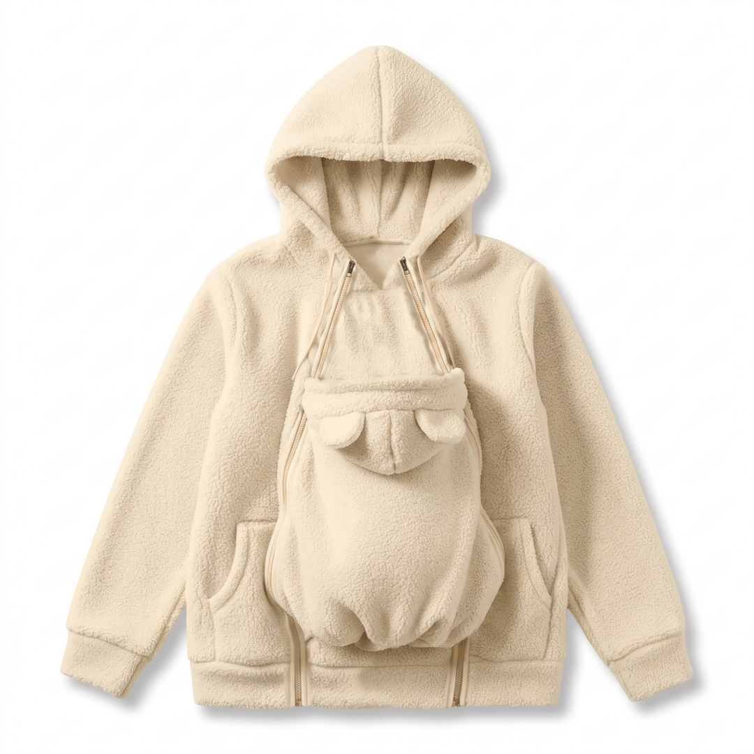 Crèmekleurige sherpa-fleecehoodie plat gelegd met het babypaneel met beren-oortjes, twee voorzakken en dubbele ritsen. 11