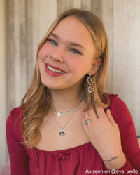Double heart pendant earrings