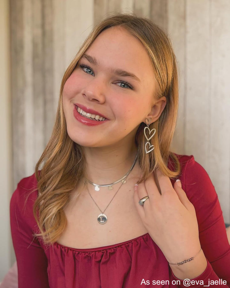 Double heart pendant earrings