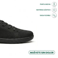 Detail van de brede neus van de zwarte sneaker met pictogrammen voor elastisch materiaal en een flexibele zool. 14
