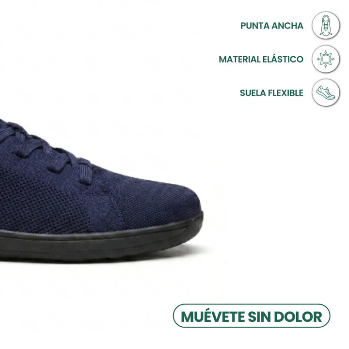 Detail van de brede neus van de marineblauwe gebreide sneaker met zwarte zool, met pictogrammen voor elastisch materiaal en flexibele zool. 23