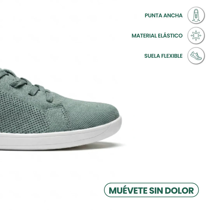 Detail van de brede neus van de groene gebreide sneaker met witte zool, met pictogrammen voor elastisch materiaal en flexibele zool. 32