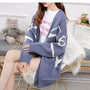 Gestrickte Strickjacke mit verspieltem Print und Knopfleiste - Nova