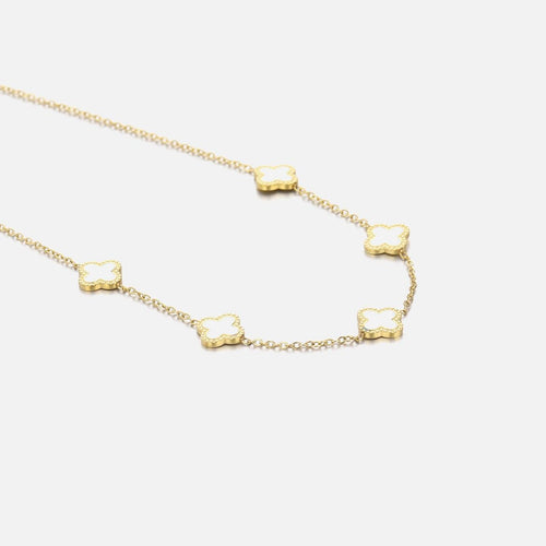 Gold chain with white clovers