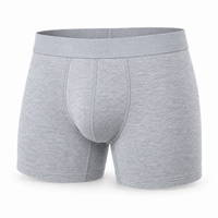 Lichtgrijze gemêleerde boxershort van voren, los getoond, met brede tailleband en zichtbare stikseldetails rond het kruis. 7