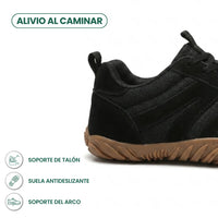 Zijaanzicht van de hiel van een zwarte barefoot sneaker van gaas en suède met bruine zool, met pictogrammen. 22