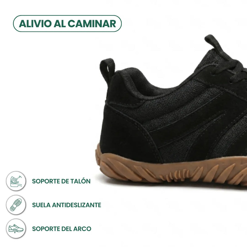 Zijaanzicht van de hiel van een zwarte barefoot sneaker van gaas en suède met bruine zool, met pictogrammen. 22