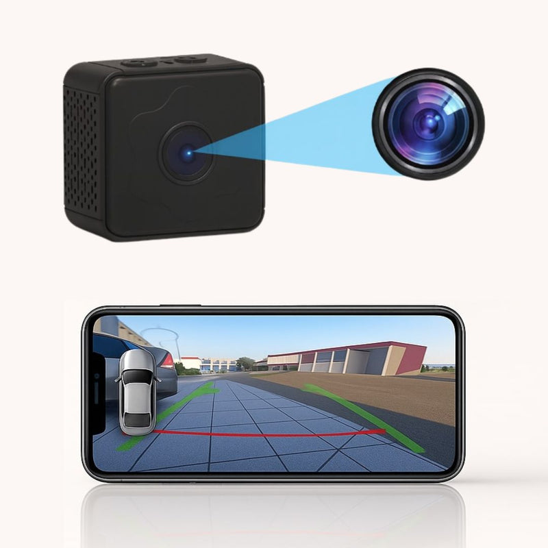 Zwarte kubusvormige camera met uitvergrote lens en een smartphone die het achteruitrijbeeld met groene en rode hulplijnen toont. 2